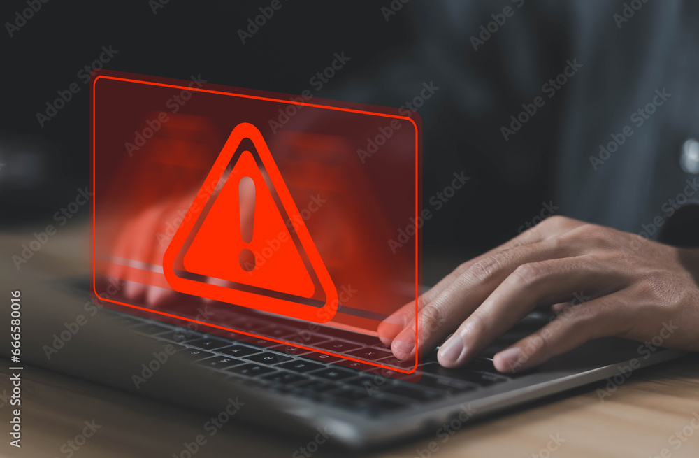 Poster laptop shows a warning sign of system failure and notification spam