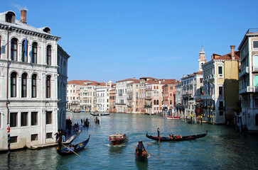 This view of the Grand Canal in Venice captures the essence of this unique city. Gondolas, symbols...