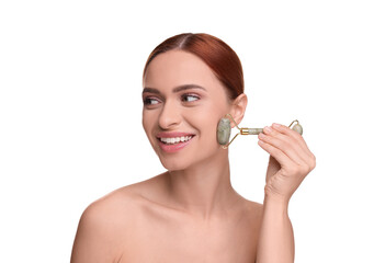 Fototapeta premium Young woman massaging her face with jade roller on white background
