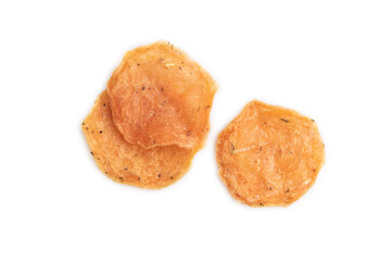 Slices of dehydrated salted meat chips isolated on  white, top view