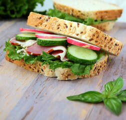 fresh lunch sandwich with fresh vegetables and ham