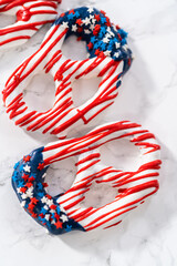 Obraz premium Red White and Blue Chocolate Covered Pretzel Twists
