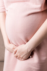 urinary incontinence during pregnancy. Abdominal pain during pregnancy. Maternity healthcare concept