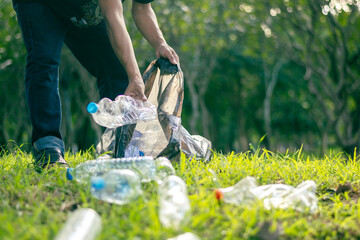 Workers collect plastic bottle trash