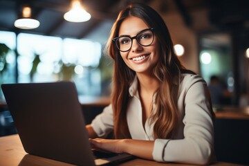 Focused Young Professional Working Remotely in a Modern Cafe