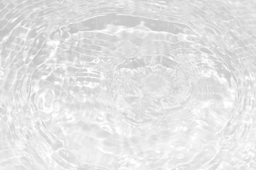 Defocus blurred transparent white colored clear calm water surface texture with splashes...