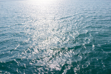 Blue sea surface with waves