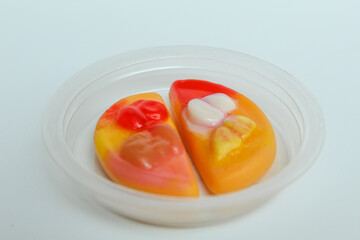 Gummy candy in pizza form. Isolated on white background