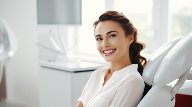smiling woman sitting in a dentist's chair