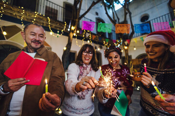Mexican Posada, hispanic family Singing carols in Christmas celebration in Mexico Latin America...