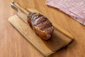 picanha steak on a wooden cutting board