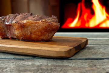 picanha steak on a fire background. top sirloin meat beef steak