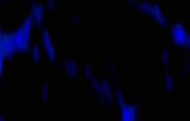 Streaks of blue plasma dripping on a black background