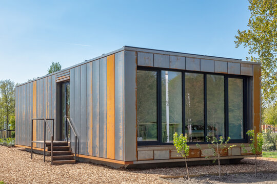 Contemporary designed new corten steel tiny house on the Floriade expo in Almere, The Netherlands on April 21, 2022