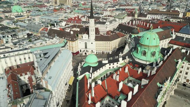 Cathedrals and cityscape City of Vienna, Austria. Roman Catholic Archdiocese of Vienna, Vienna aerial skyline view from drone video. Hofburg Palace and heritage buildings in the Historic Centre