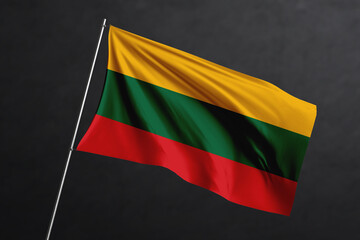 3D Waving flag design. Lithuania National flag on black background.