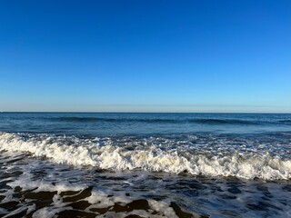 Fototapeta na wymiar Blue sea horizon, natural blue seascape background, ocean bay, clear sky