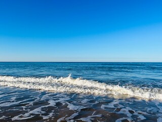 Blue sea horizon, natural blue seascape background, ocean bay, clear sky