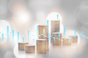 Stack of coins and growth graph on bokeh background. Sustainable business with return on investment...