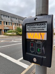 Close up of pedestrian wait crosswalk button