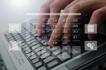 Reminder calendar and Businessman hands on keyboard