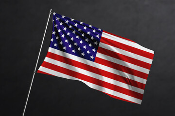 Obraz premium 3D Waving flag design. United States National flag on black background.