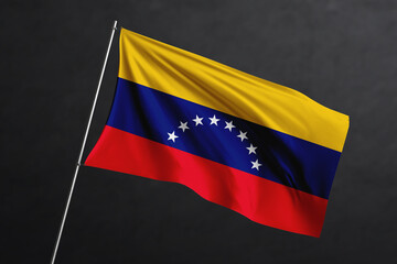 3D Waving flag design. Venezuela National flag on black background.