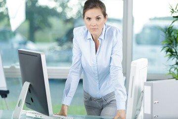 beautiful businesswoman looking at camera angry