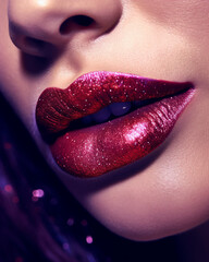 Young woman with beautiful lips, coral red nebula lipstick, closeup