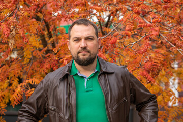 Portrait of a middle-aged man in a leather jacket