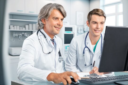Team of doctors work with laptop in modern hospital, AI generated image