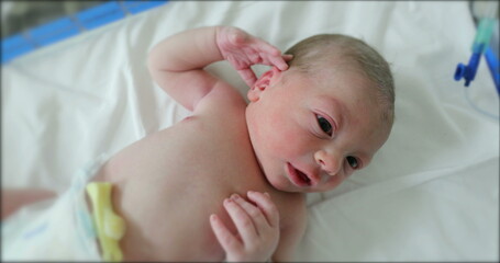 Fototapeta na wymiar Little newborn baby at hospital first day of life