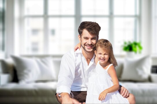 Joyful and happy dad playing with child in the room, AI generated image