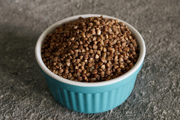 Buckwheat in a bowl, close-up, vegetarian food, healthy food