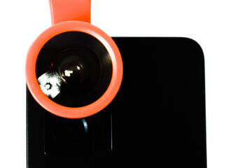 Close up Clip on fisheye lens on black smartphone, extension fish eye lens on smartphone  camera isolated on white background