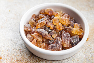 rock sugar crystals pieces candy brown sugar candied big rock caramel taste cane sugar healthy eating cooking appetizer meal food snack on the table