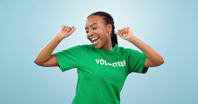 Woman, volunteer and dancing in happiness in studio on blue background with mockup for social media. African, person or girl with smile on face in campaign for community service, donation or vote