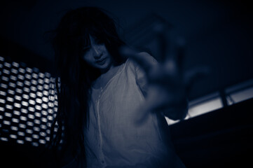 Portrait of asian woman make up ghost,Scary horror scene for background,Halloween festival...