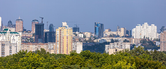 Aerial photography of residential areas of Kyiv with a view of the railway station and new skyscrapers under construction, aerial view, city photography. Copy space