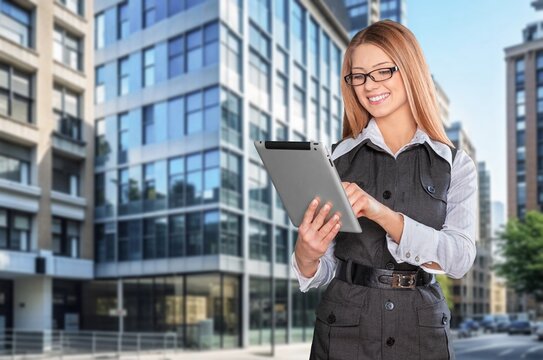 Portrait of successful business woman hold digital tablet, AI generated image