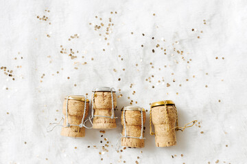 Aesthetic still life New Year, xmas minimal style trend flat lay, wine corks champagne sparkling...