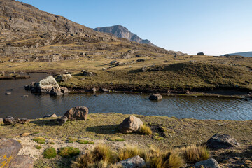 Beautiful lagoon surrounded by mountains in the scenic Tunari National Park near Cochabamba,...