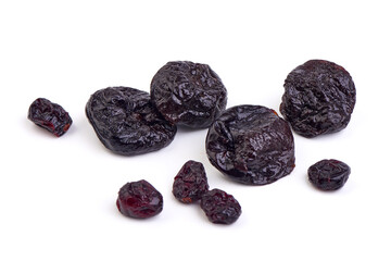 Prunes, dried fruits, close-up, isolated on white background.