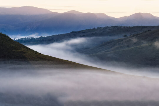 Early morning fog over valleys and mountains, Serra da Canastra, Minas Gerais state, Brazil