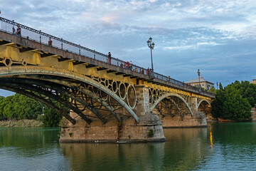 Fototapeta premium Isabella II. bridge or Triana bridge or in spanish Puente de Isabel II in Sevilla