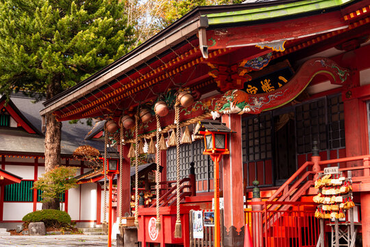Suzu hanging under the eaves of a Shinto shrine in Japan