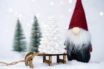 Christmas decoration on snowy background. DIY gifts. Close-up. Selective focus.