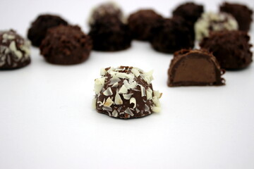 Several chocolates on white background