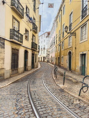 Old European street with tram tracks