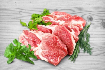 Raw fresh pork red meat on a desk